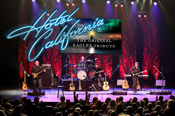 Greg Frewin - Hotel California promotional image with the band playing